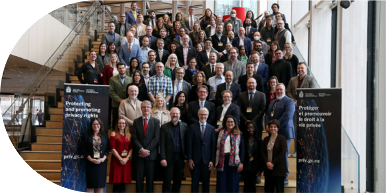 OPC International Privacy and Generative AI Symposium attendees gather for a group photo. 